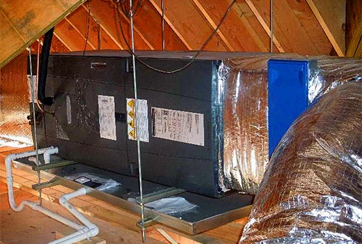 Professional AC installation Houston TX - New American Standard HVAC equipment with whole home air filter installed in attic by Adams Air