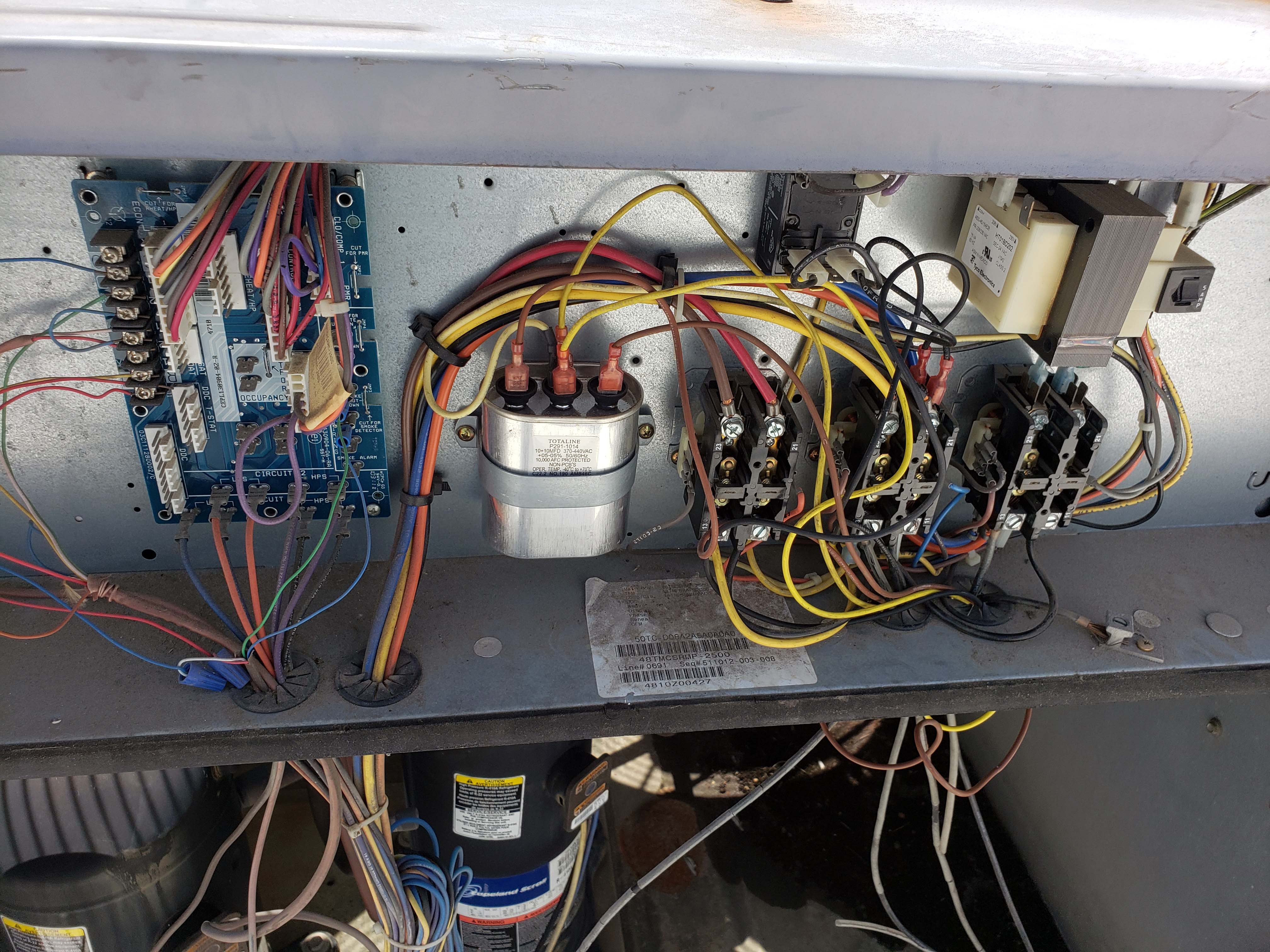 Professional AC repair Houston - Capacitor replacement service in air conditioner by Adams Air licensed technician