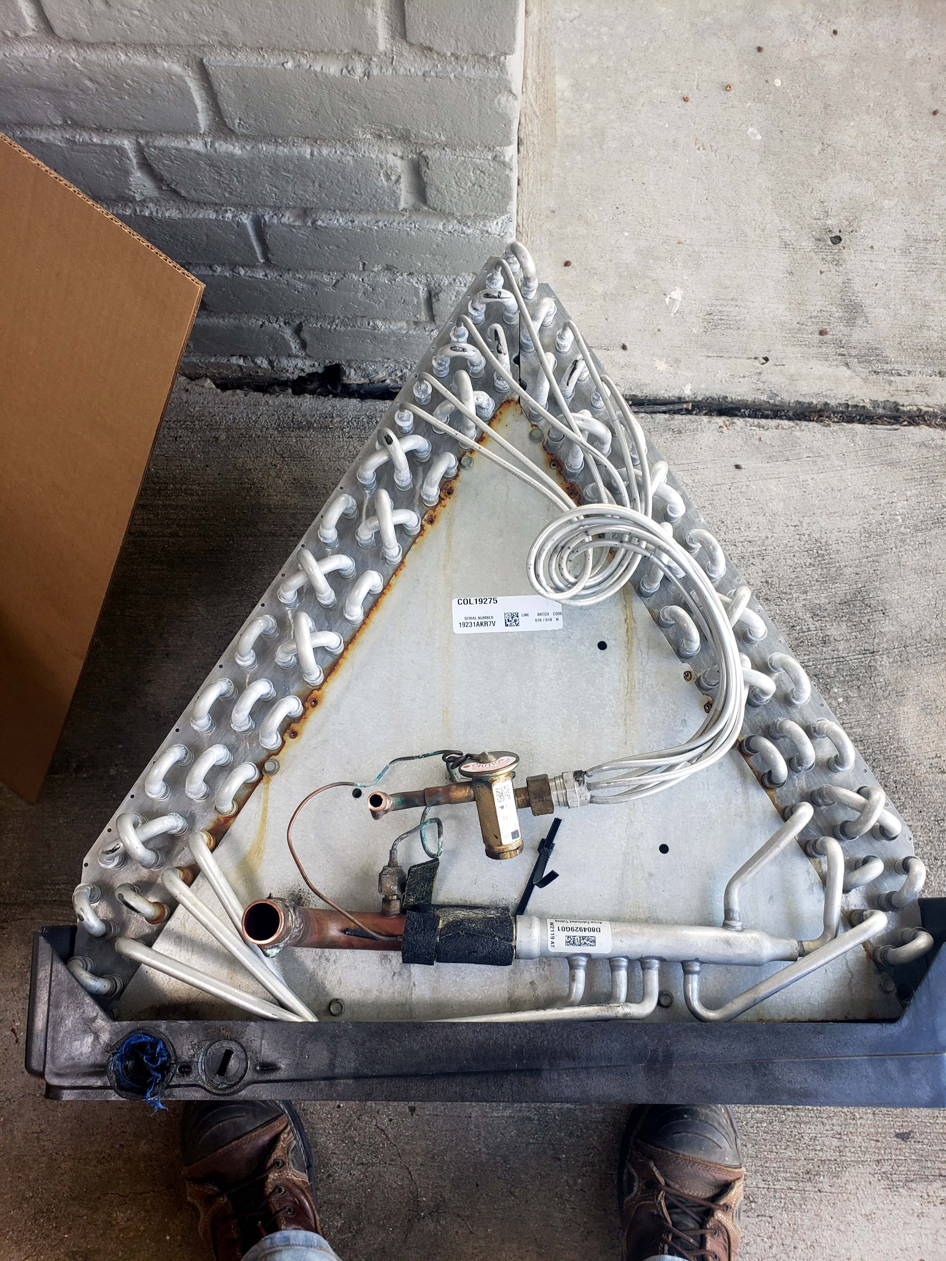 AC repair Houston - Old leaking evaporator coil replacement service by Adams Air professional technician