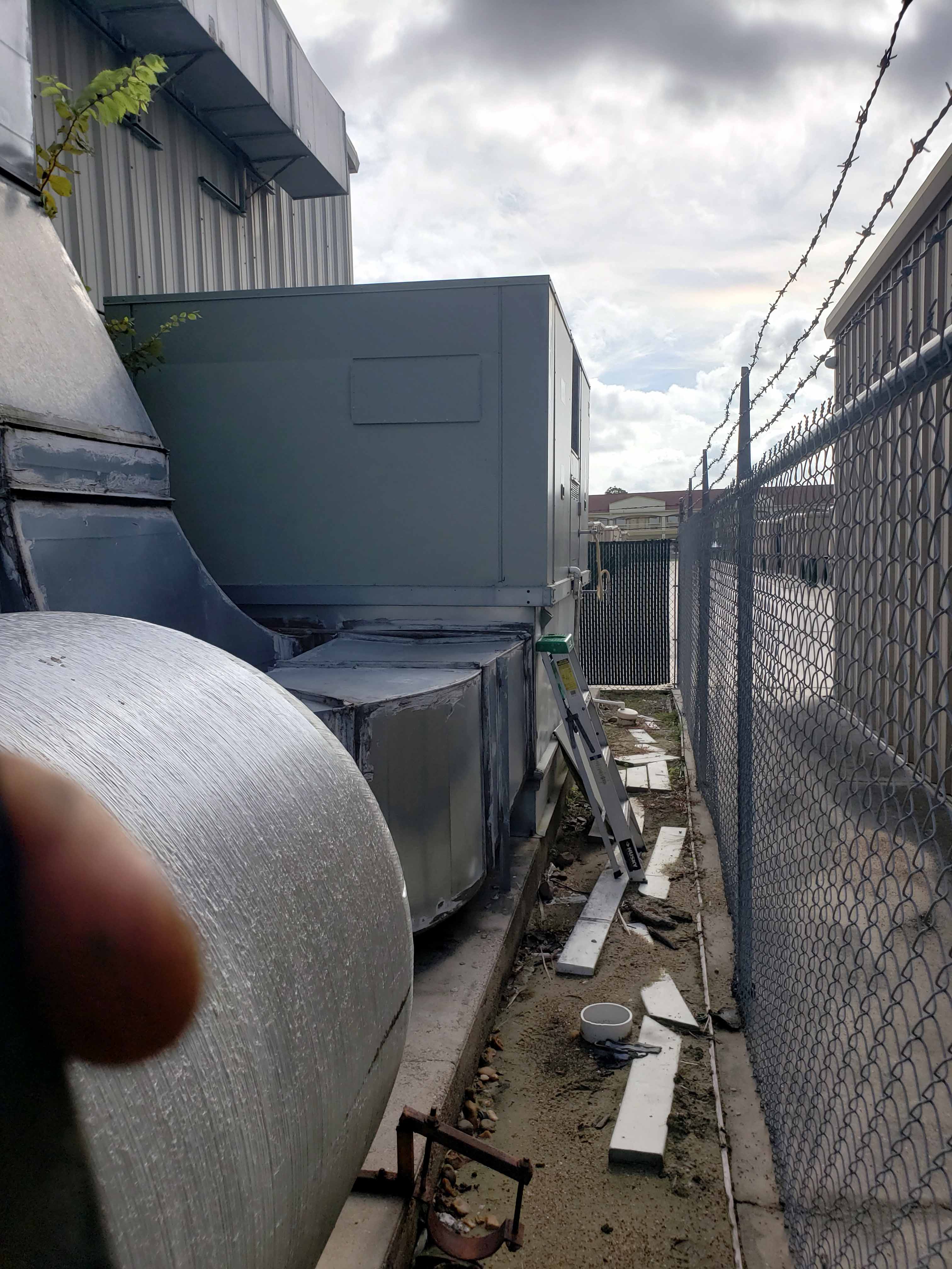 Commercial AC installation Houston - New packaged HVAC unit freshly installed for pool room climate control by Adams Air
