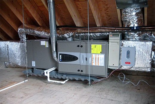 Professional gas furnace installation in a Houston home showing high-efficiency natural gas heating system installation